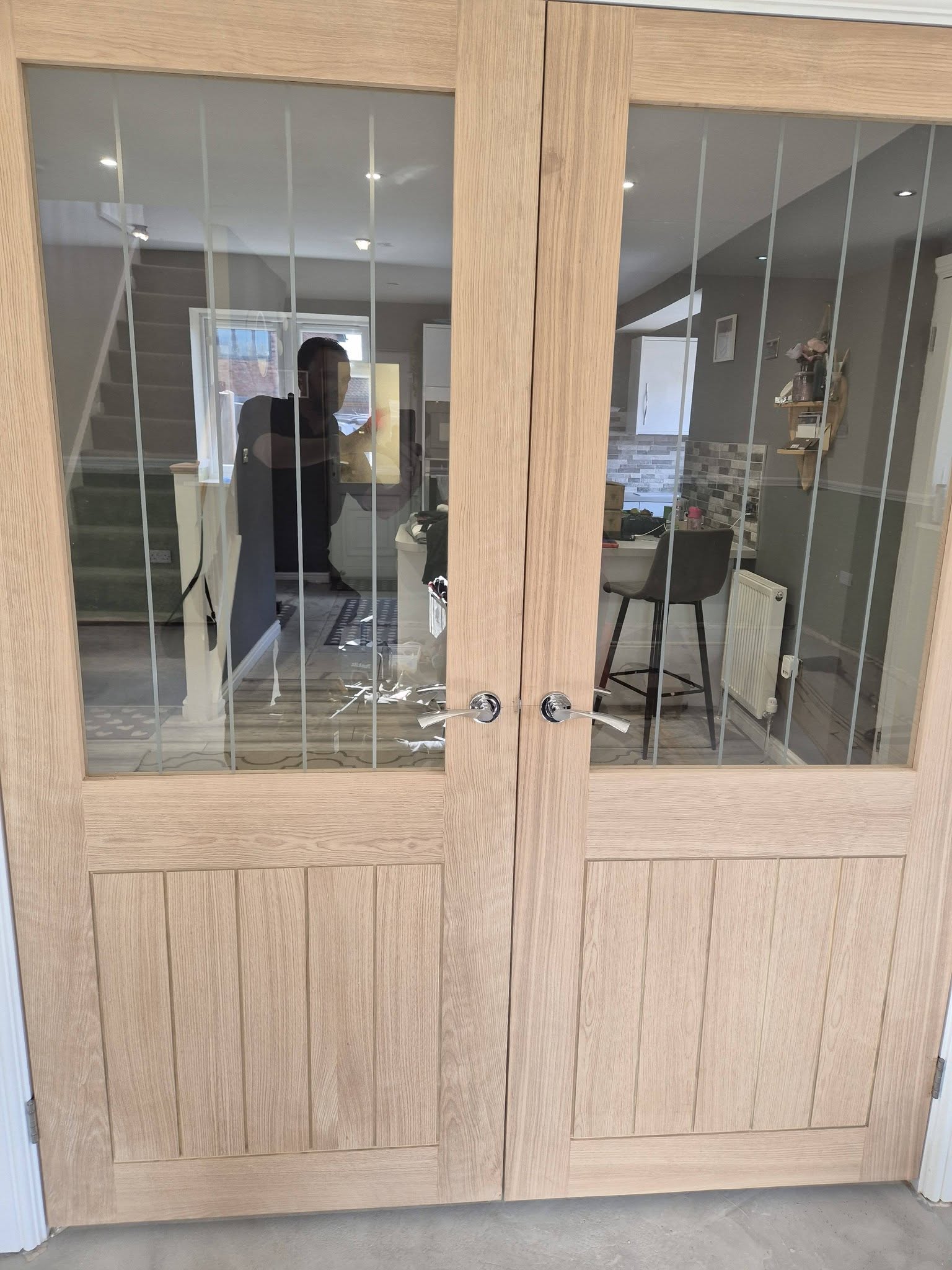 Oak internal double doors fitted by Molland and Owen Carpentry